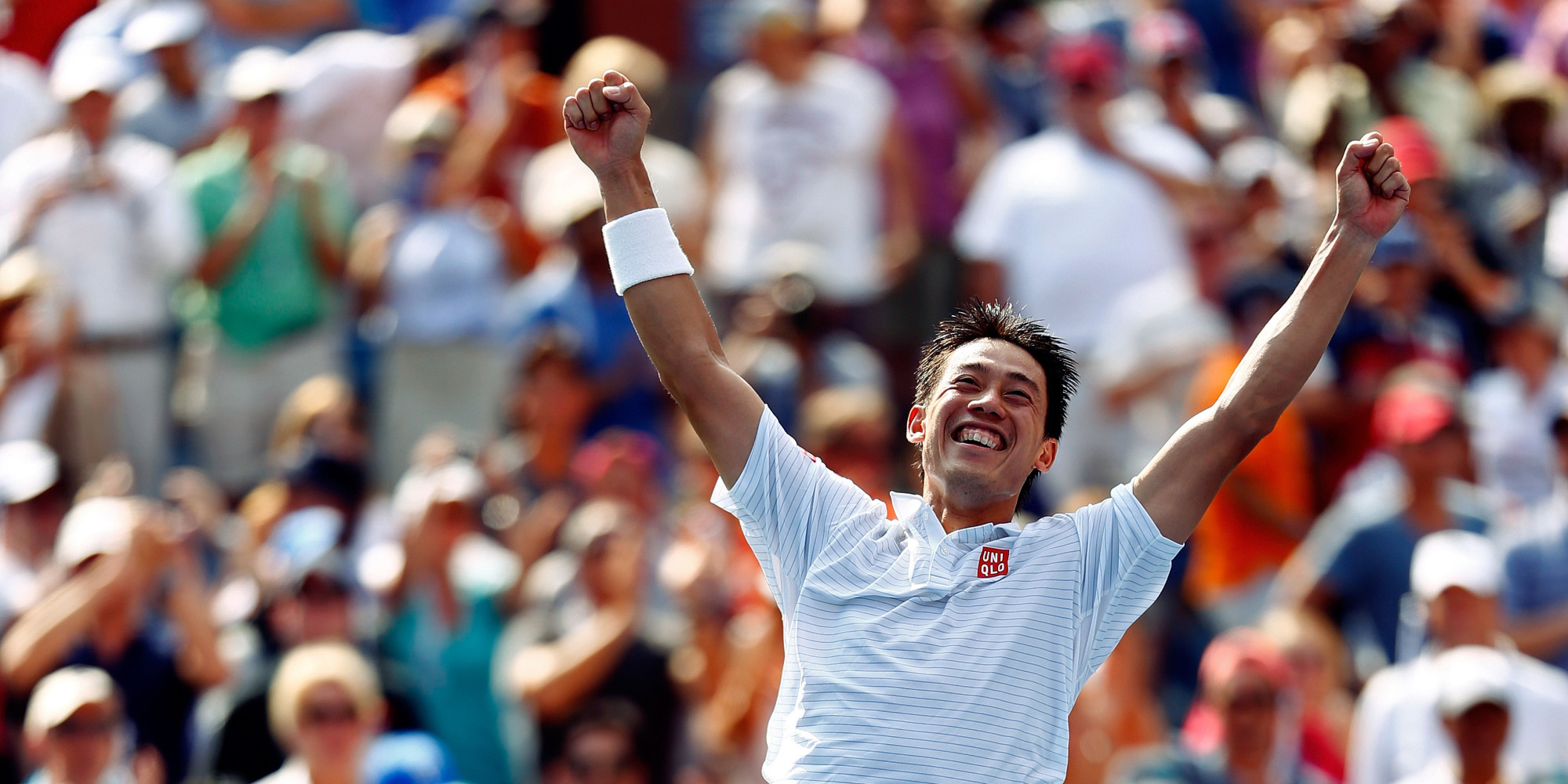 NEW YORK, NY - SEPTEMBER 06:  Kei Nishikori of Japan celebrates after defeating Novak Djokovic of Serbia in their men's singles semifinal match on Day Thirteen of the 2014 US Open at the USTA Billie Jean King National Tennis Center on September 6, 2014 in the Flushing neighborhood of the Queens borough of New York City.  Nishikori defeated Djokovic in four sets 6-4, 1-6, 7-6, 6-3.  (Photo by Julian Finney/Getty Images)